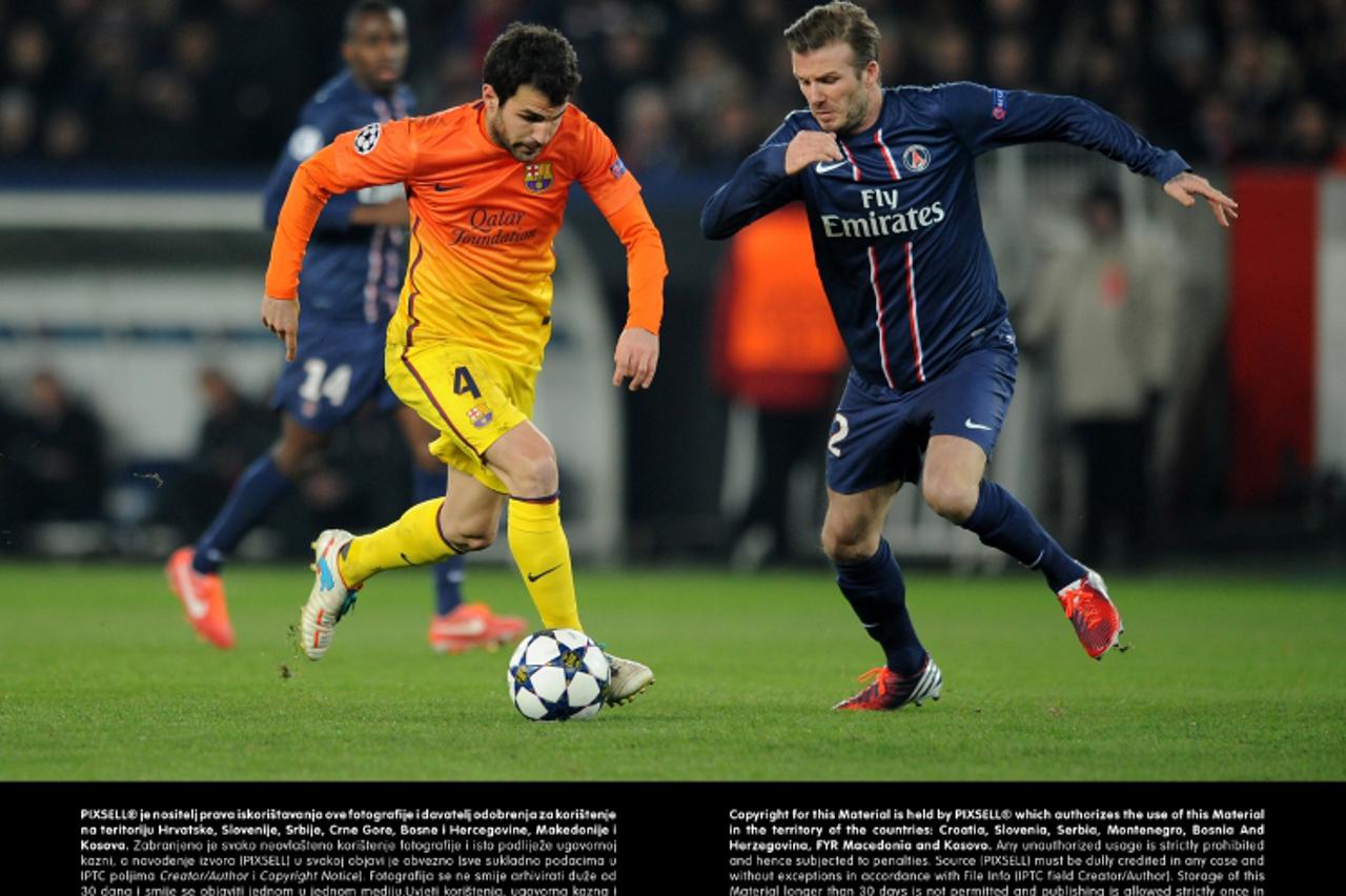 'Paris Saint-Germain\'s David Beckham (right) and Barcelona\'s Cesc FabregasPhoto: Press Association/PIXSELL'