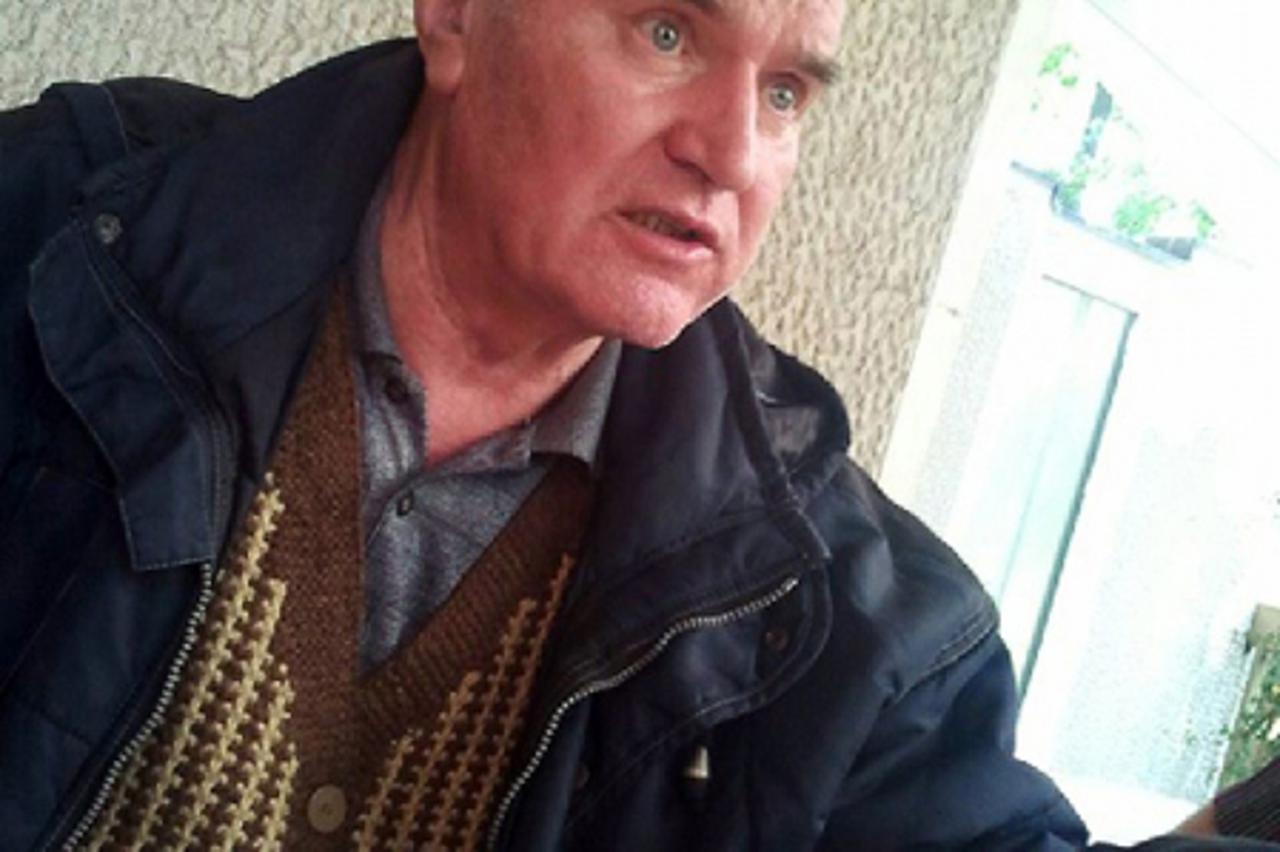 'Bosnian Serb wartime general Ratko Mladic in seen in this handout photo taken in Belgrade May 26, 2011, and released to Reuters on May 28, 2011. Mladic is fit enough to face genocide charges in The H
