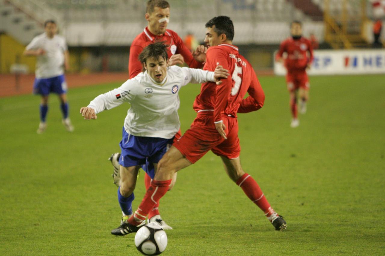 \'12.03.2011., Split - 1. HNL, nogometna utakmica 21. kola izmedju HNK Hajduk Split i RNK Split. Start Velimira Vidica na Anti Vukusicu. Photo: Ivo Cagalj/PIXSELL\'