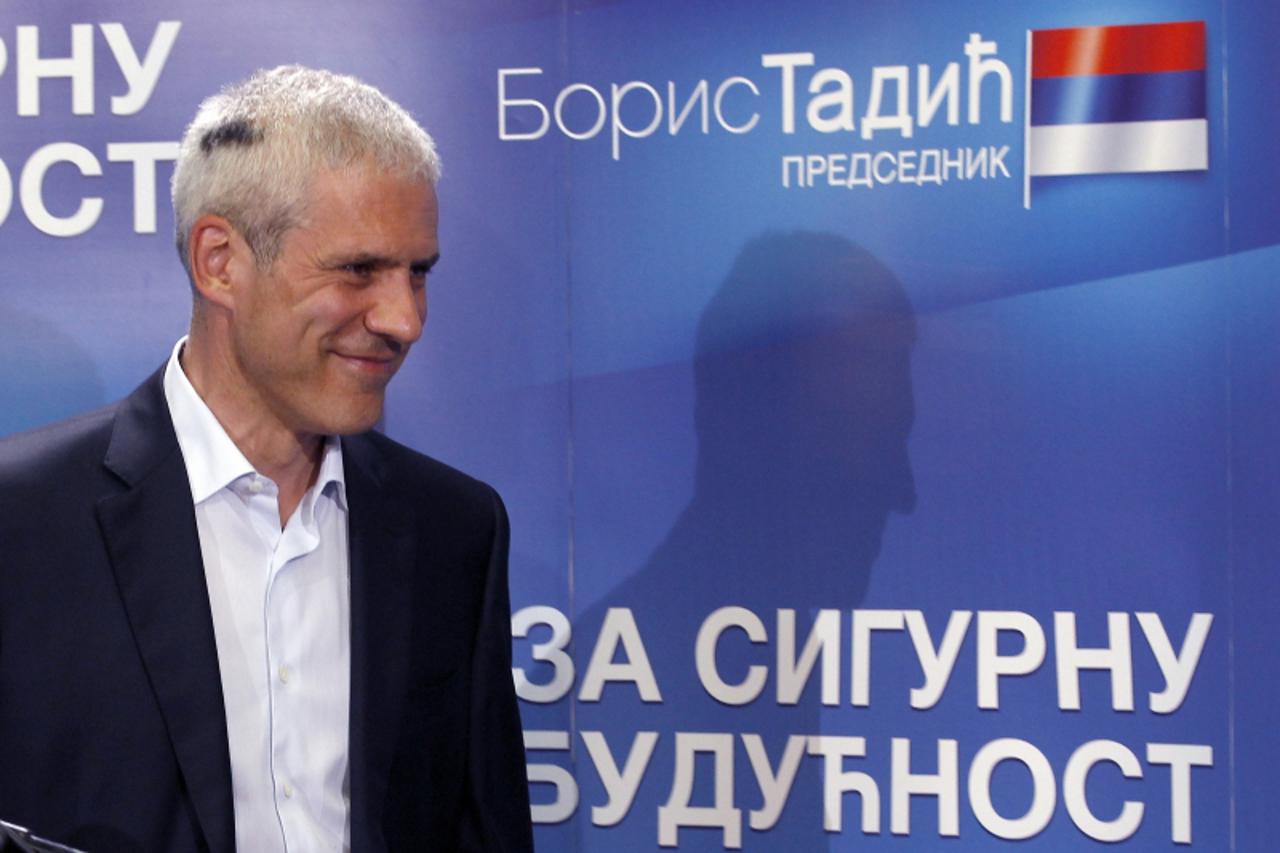 'Democratic Party leader and presidential candidate Boris Tadic leaves a media conference after presidential elections in Belgrade May 20, 2012. Tadic, the incumbent since 2004, conceded defeat on Sun