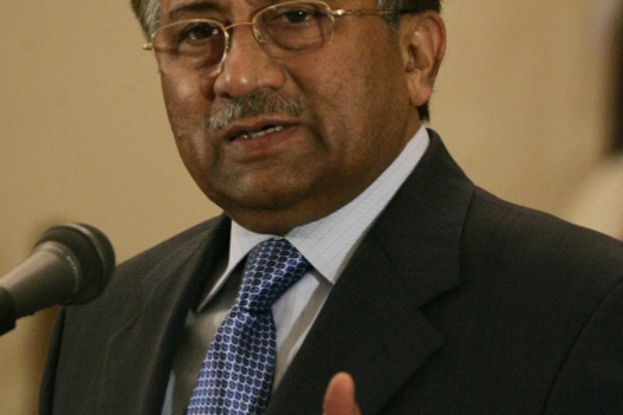 \'Pakistan\'s President Pervez Musharraf gestures during a joint news conference with his Afghan counterpart Hamid Karzai in Islamabad December 26, 2007.The leaders of Pakistan and Afghanistan vowed o