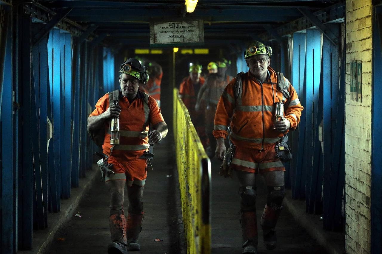 Miners leave after working the final shift at Kellingley Colliery on its last day of operation in north Yorkshire, England, December 18, 2015. Kellingley is the last deep coal mine to close in England, bringing to an end centuries of coal mining in Britai