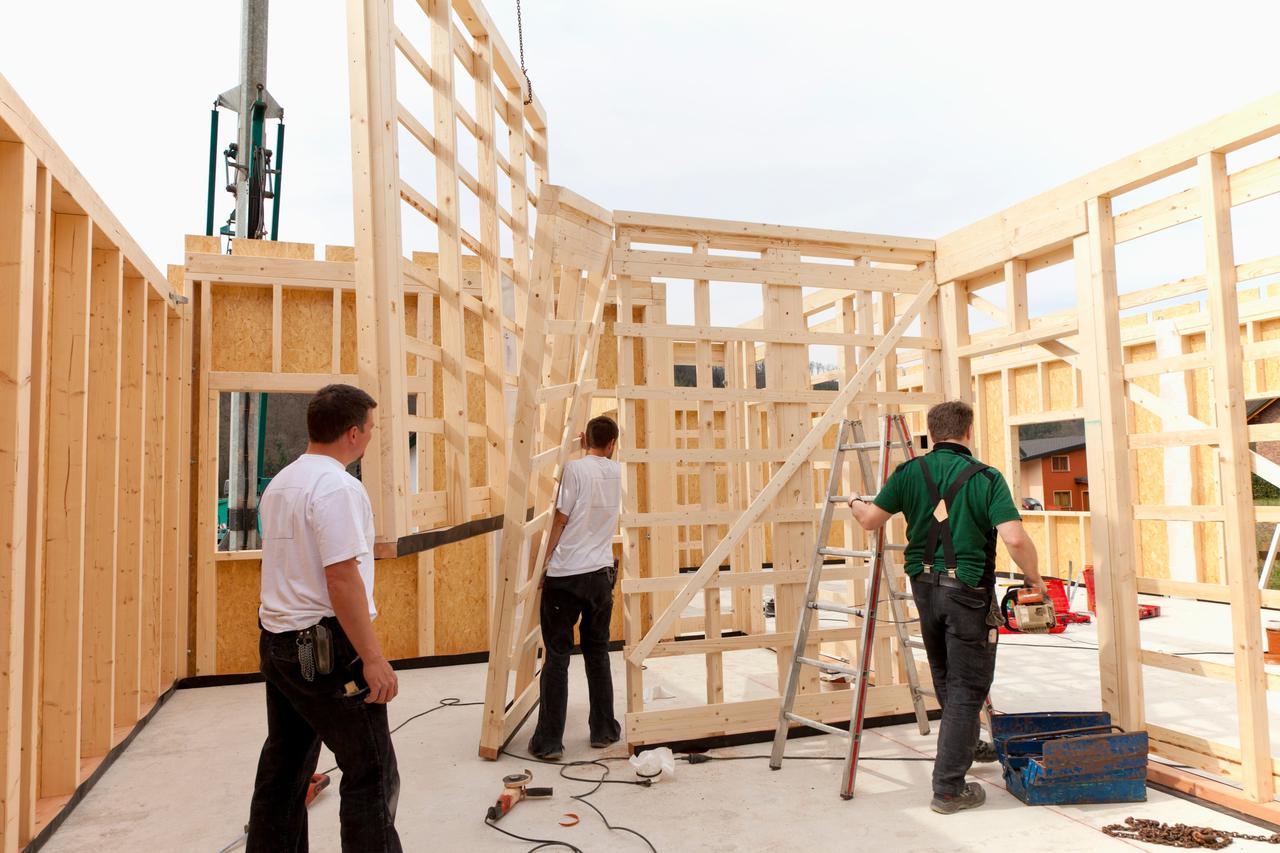 Image: 0154613517, License: Royalty free, Europe, Germany, Rhineland Palantinate, Men installing and fixing wooden walls of prefabricated house, Property Release: Yes, Model Release: No or not aplicable, Credit line: Profimedia.com, Westend