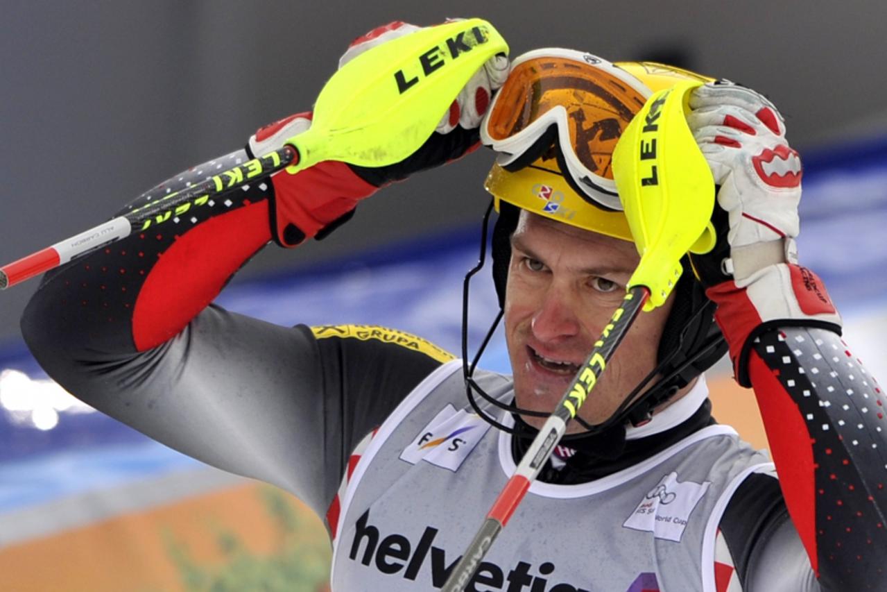 \'Croatia\'s Ivica Kostelic celebrates his victory in the men\'s giant slalom race at the FIS Alpine Skiing World Cup on January 9, 2011 in Adelboden. Kostelic won the men\'s slalom. AFP PHOTO / FABRI