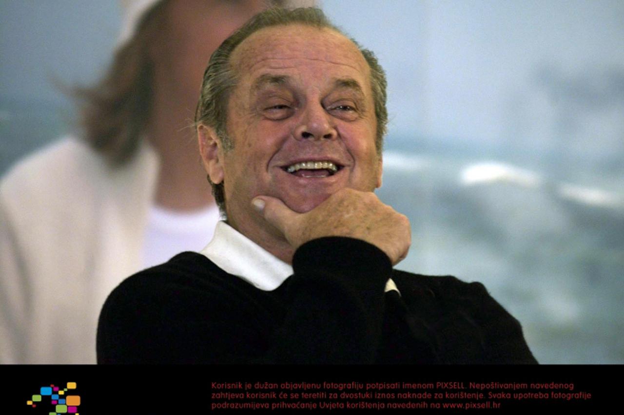 'Actor Jack Nicholson grins during a press conference and photocall to promote his new film 'Something's Gotta Give' at Claridges Hotel in central London. Photo: Press Association/Pixsell'